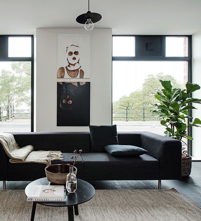 Living Room Black Floors Grey Walls And Lots Of Art